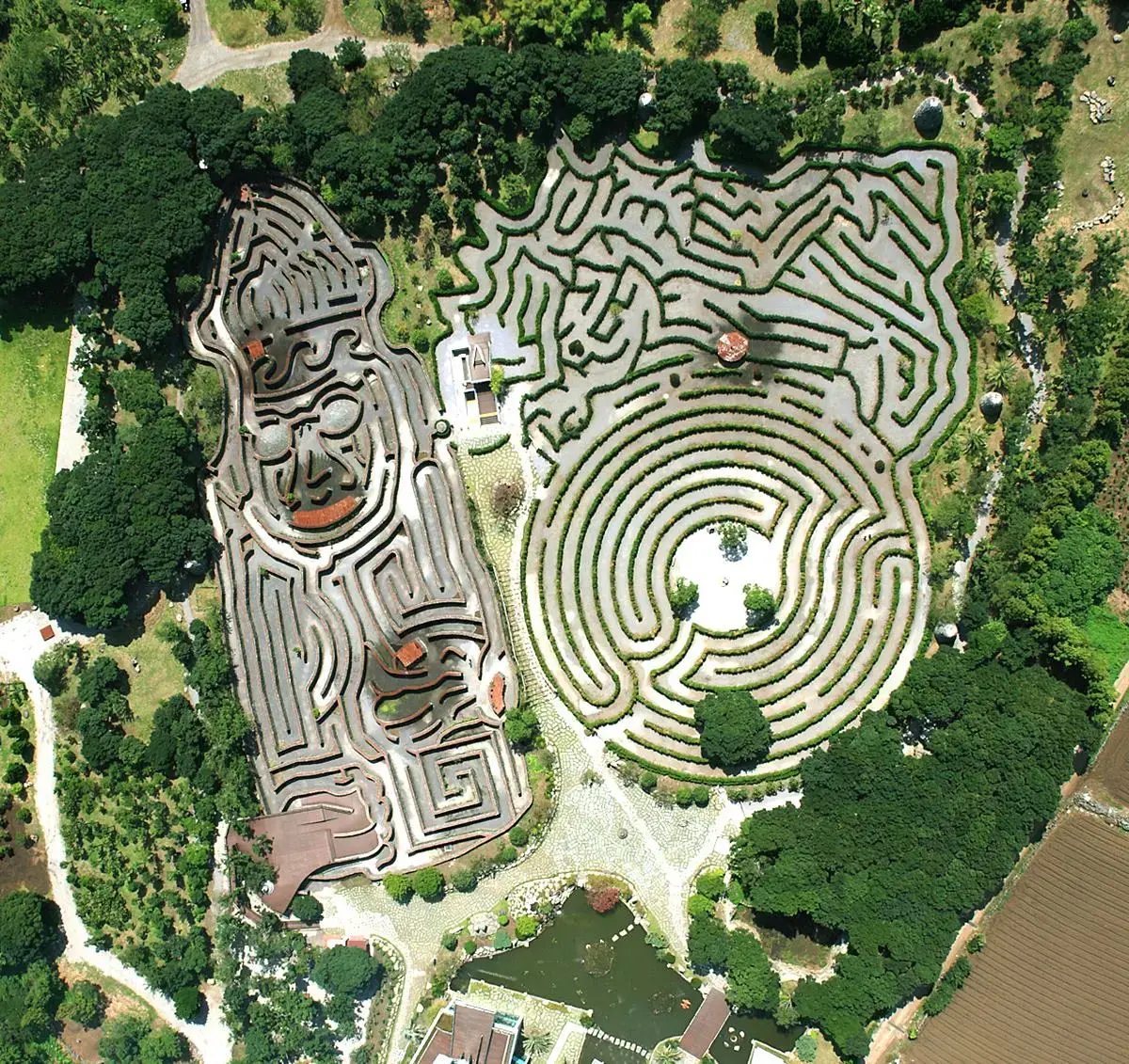 Aerial view of Maze Land in Jeju Island, South Korea, featuring stone and hedge mazes designed for family-friendly outdoor exploration and cultural experiences.