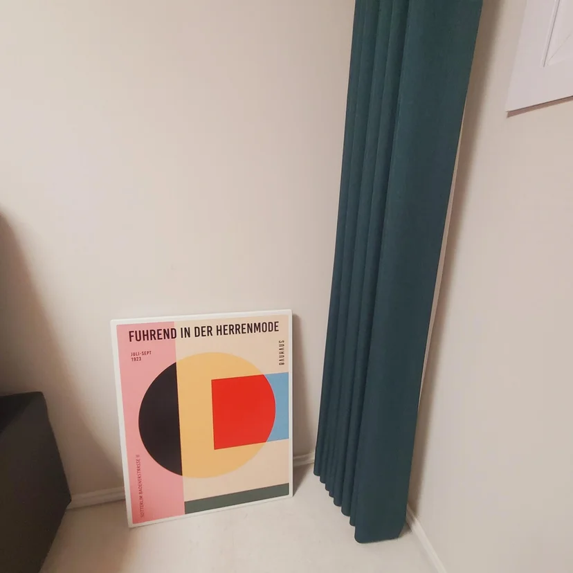 Bauhaus art print leaning by a teal curtain in the living corner (Listing ID : 6307)