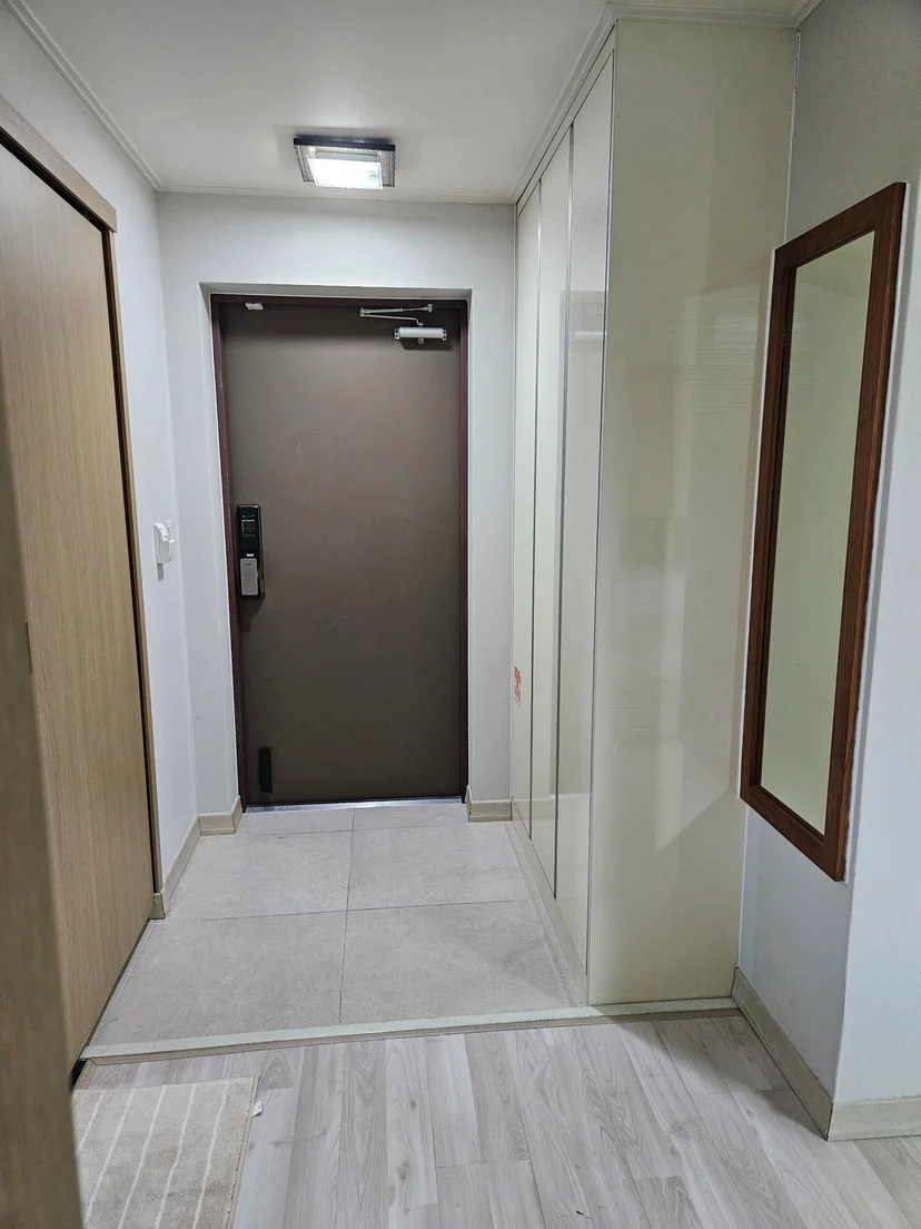Entryway with built-in shoe cabinet and front door (Listing ID : 38031)