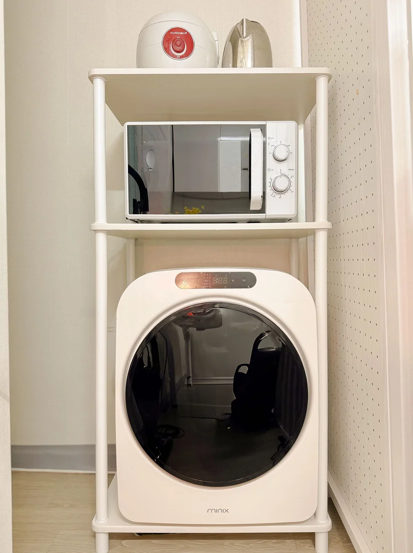 Washer, microwave, and rice cooker corner inside the short-term rental (Listing ID : 43555)