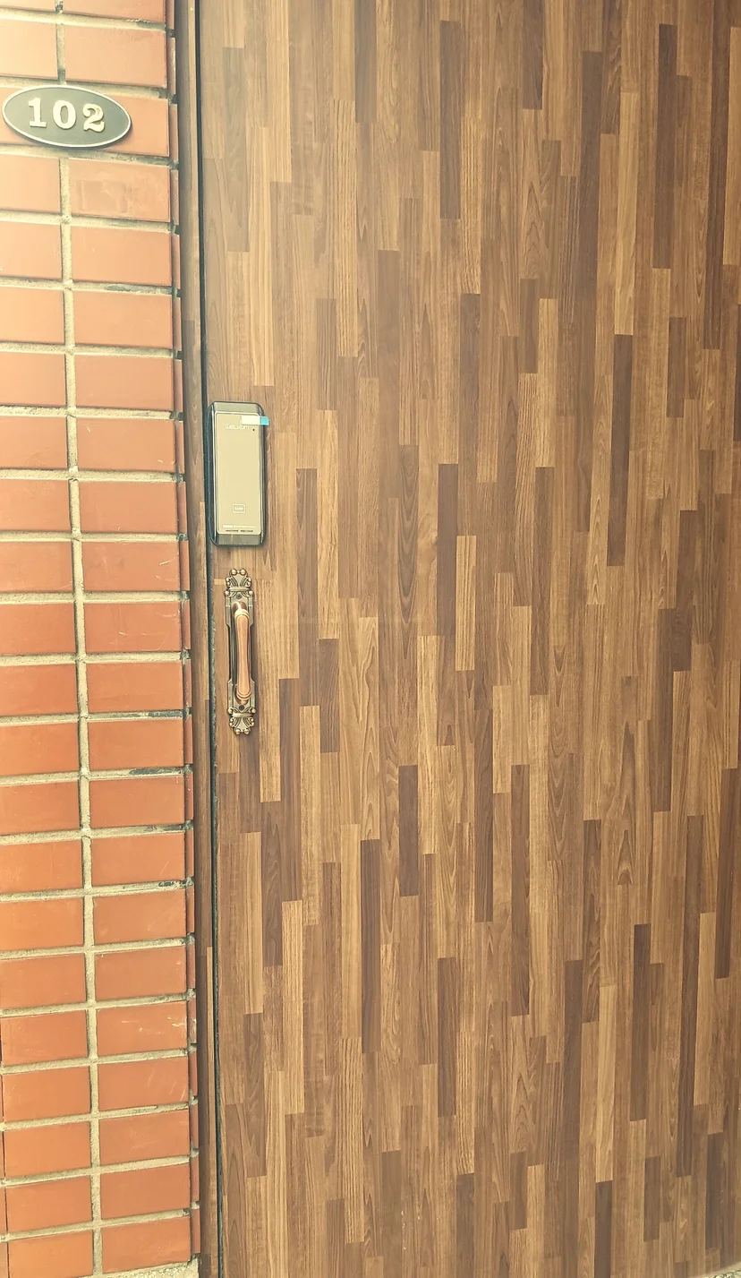 Front door with a digital keypad lock on a quiet residential lane (Listing ID : 29514)