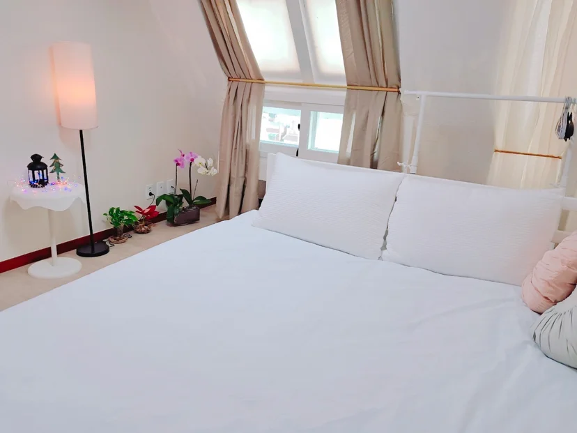 Sunlit bedroom with white bedding (House no. : 36619)