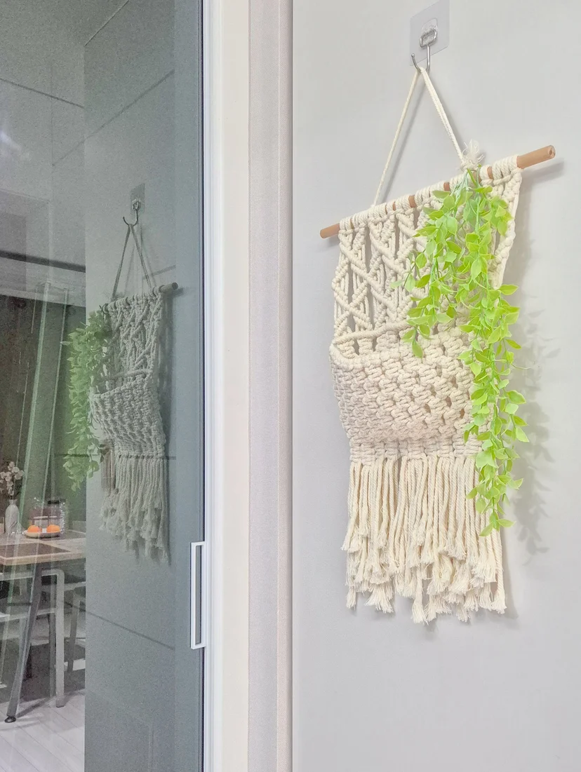 Macramé wall hanging beside a glass sliding door (Listing ID : 36403)