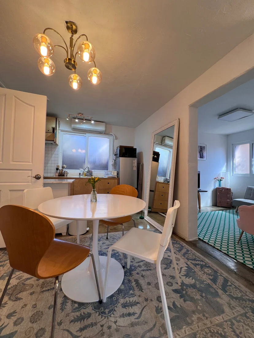 Dining table with the living room beyond (Listing ID : 24649)