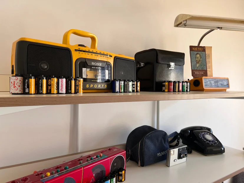 Open shelf of vintage radios and cameras (Listing ID : 24649)