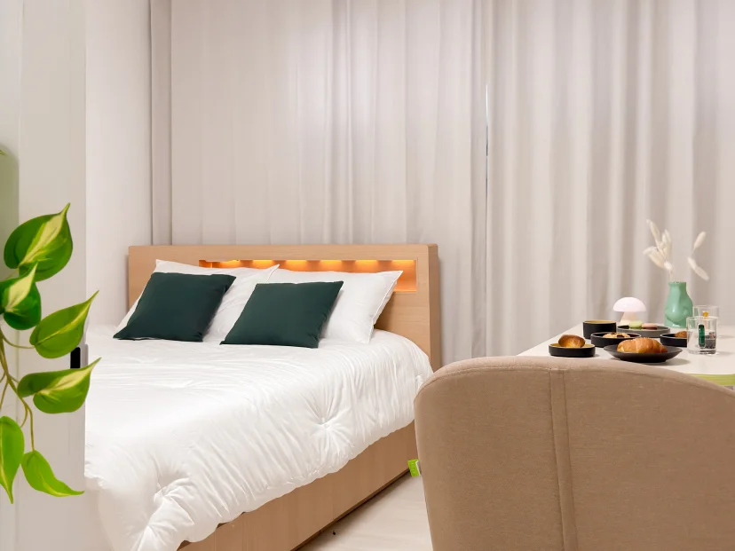 Second view of the bedroom with armchair and table (Listing ID : 47877)