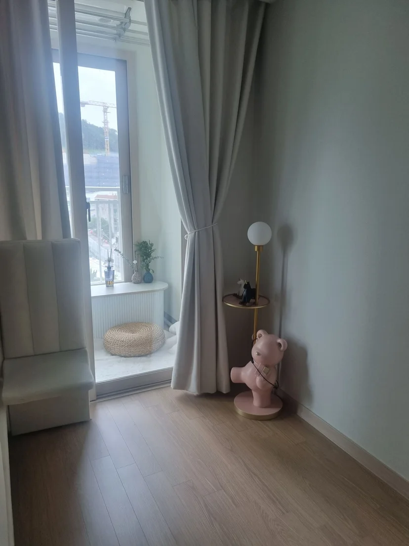 Window nook with curtains and a floor lamp (Listing ID : 26688)