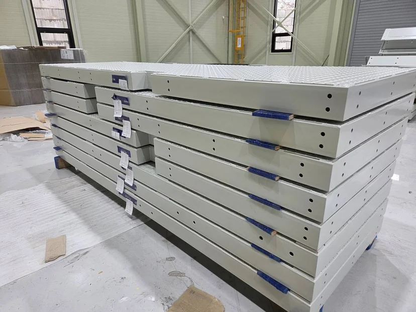 Production batch of steel platforms with QC labels ready for export to USA