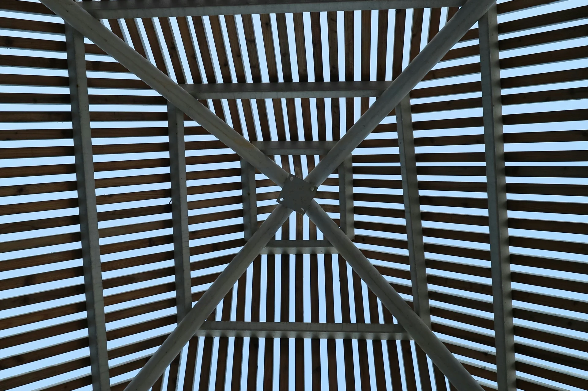 Traditional Korean temple with ornate roof and stone lanterns