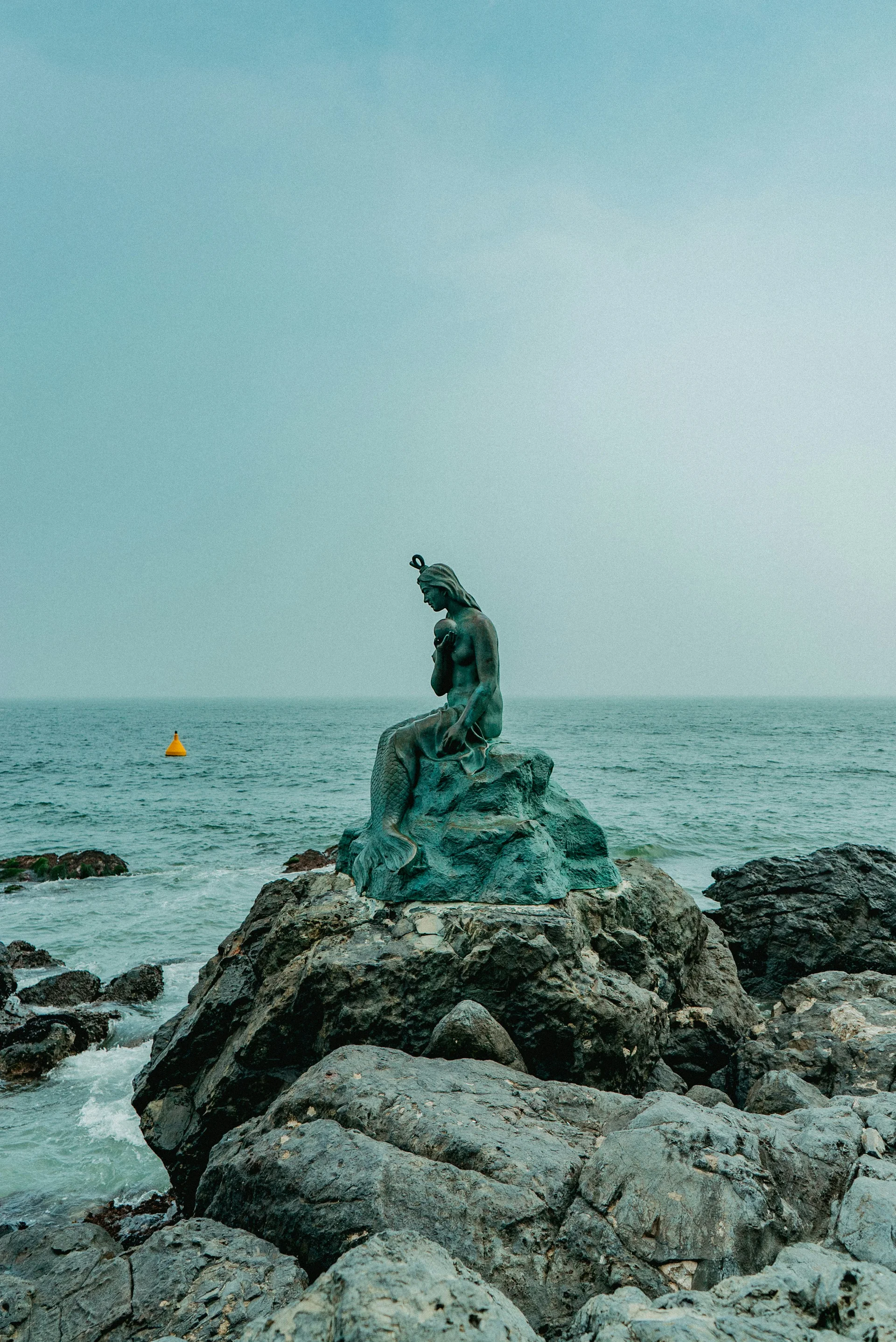 Seaside statue near the ocean at Haeundae Beach, Busan