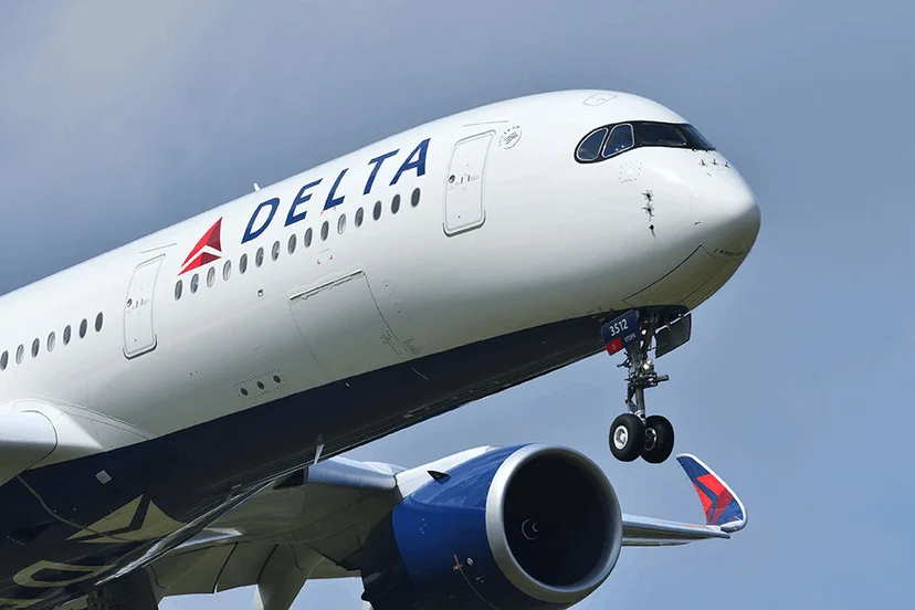 the delta airplane is flying