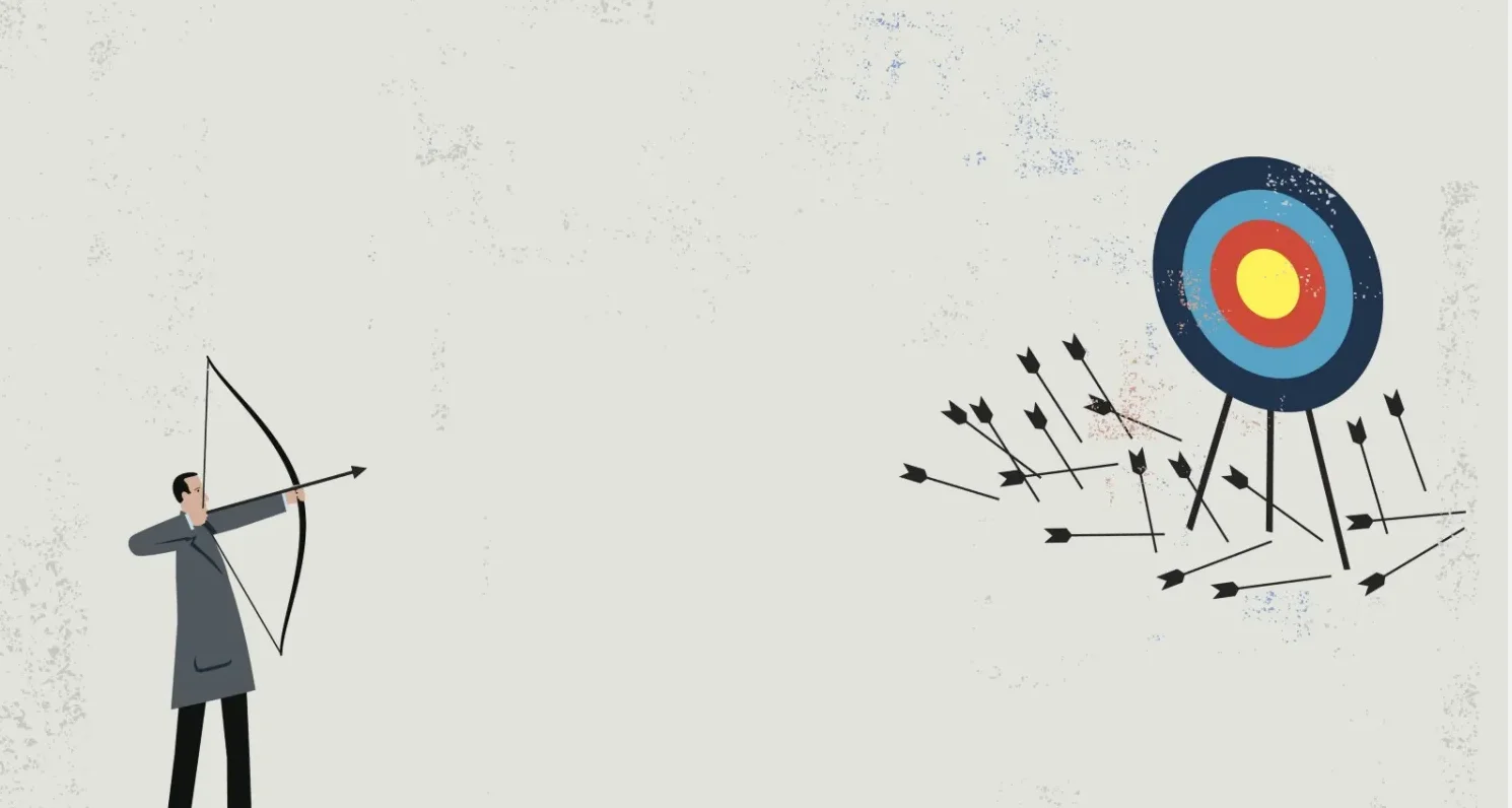 Target with failed attempts representing trial and error