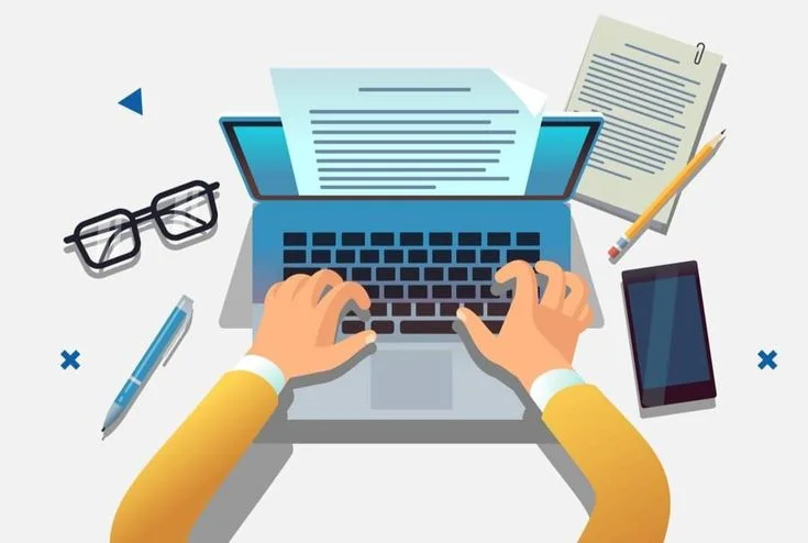 Content creation workspace with laptop and notes