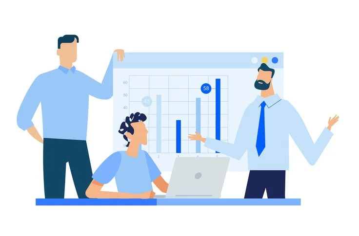 Business team reviewing analytics on screen