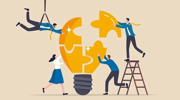 Group effort turning ideas into innovation symbol