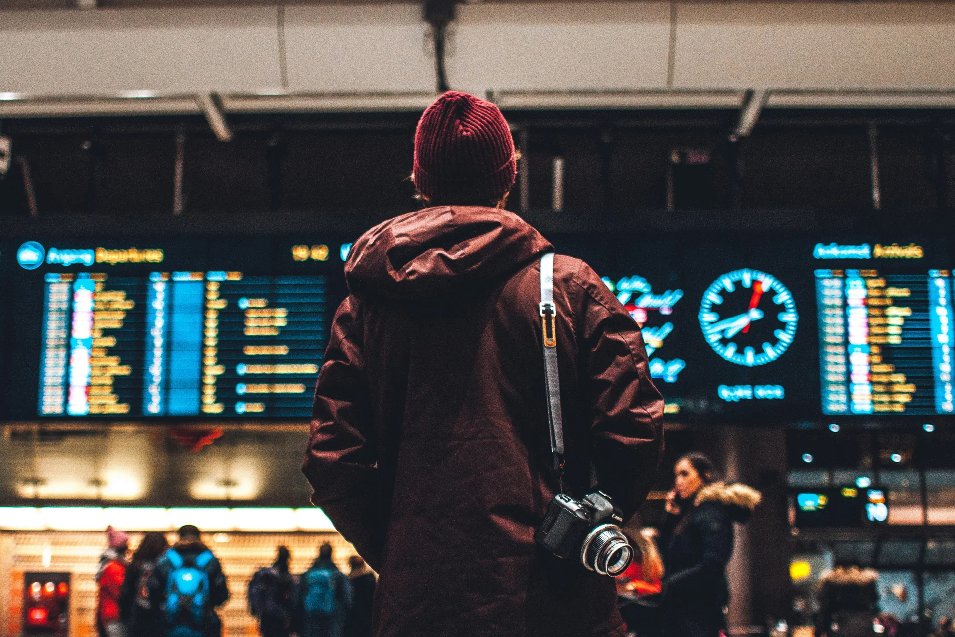 Man checking flight times to leave for a trip