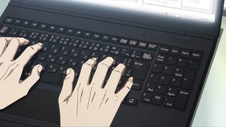 human typing on keyboard