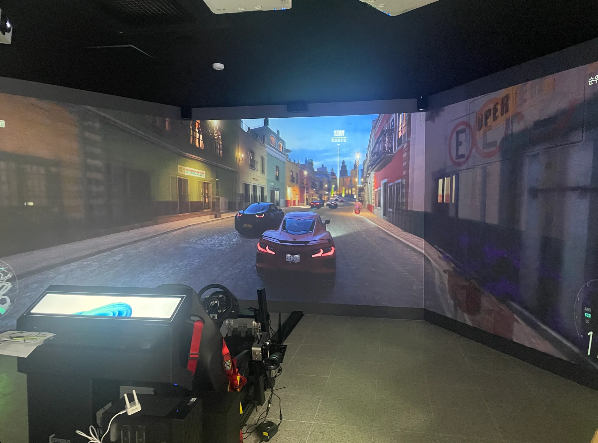 Simulator Games Experienced Through a 3-Sided Immersive Screen