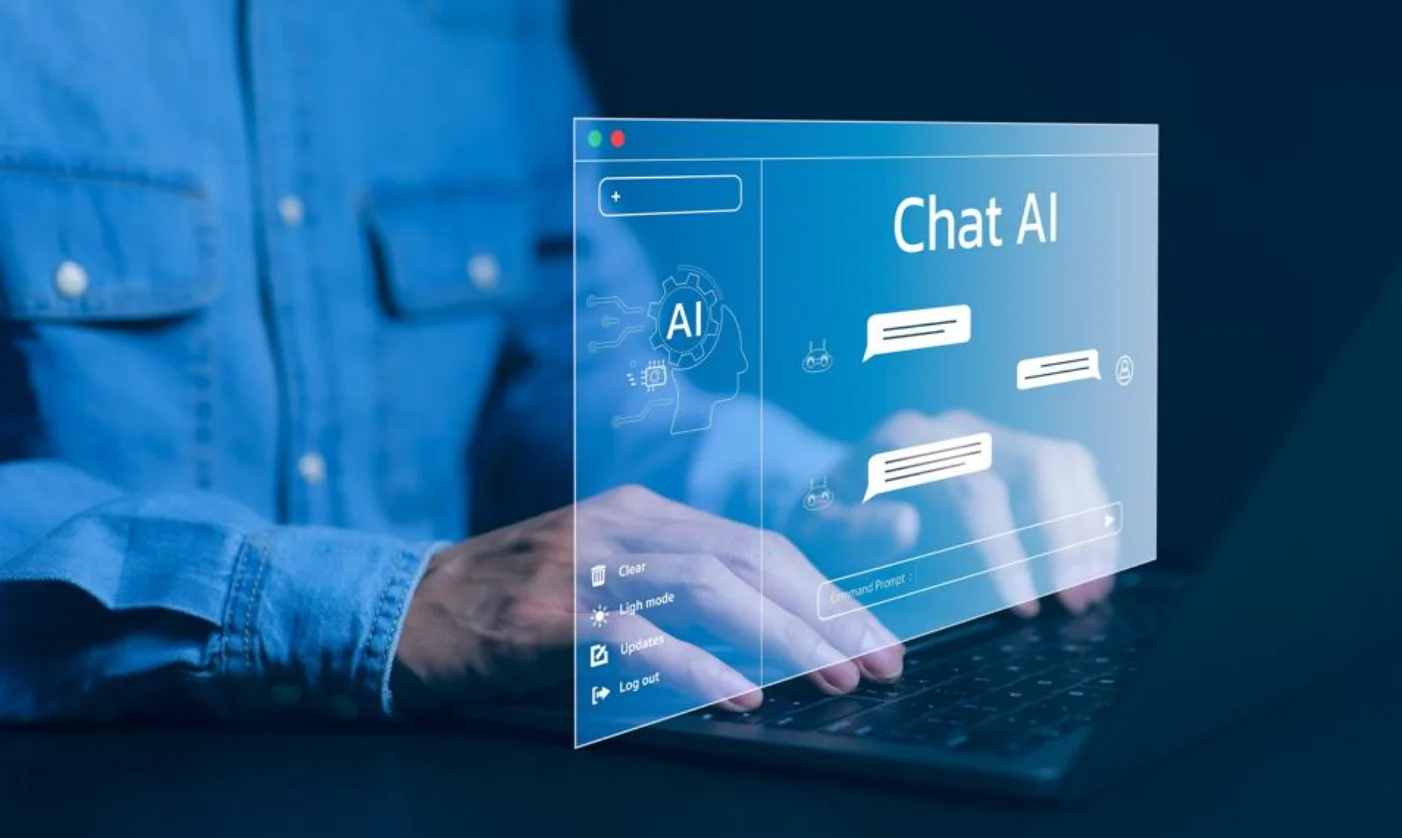 Person typing on a laptop with a futuristic AI chatbot interface, representing Chat AI technology and artificial intelligence conversation tools