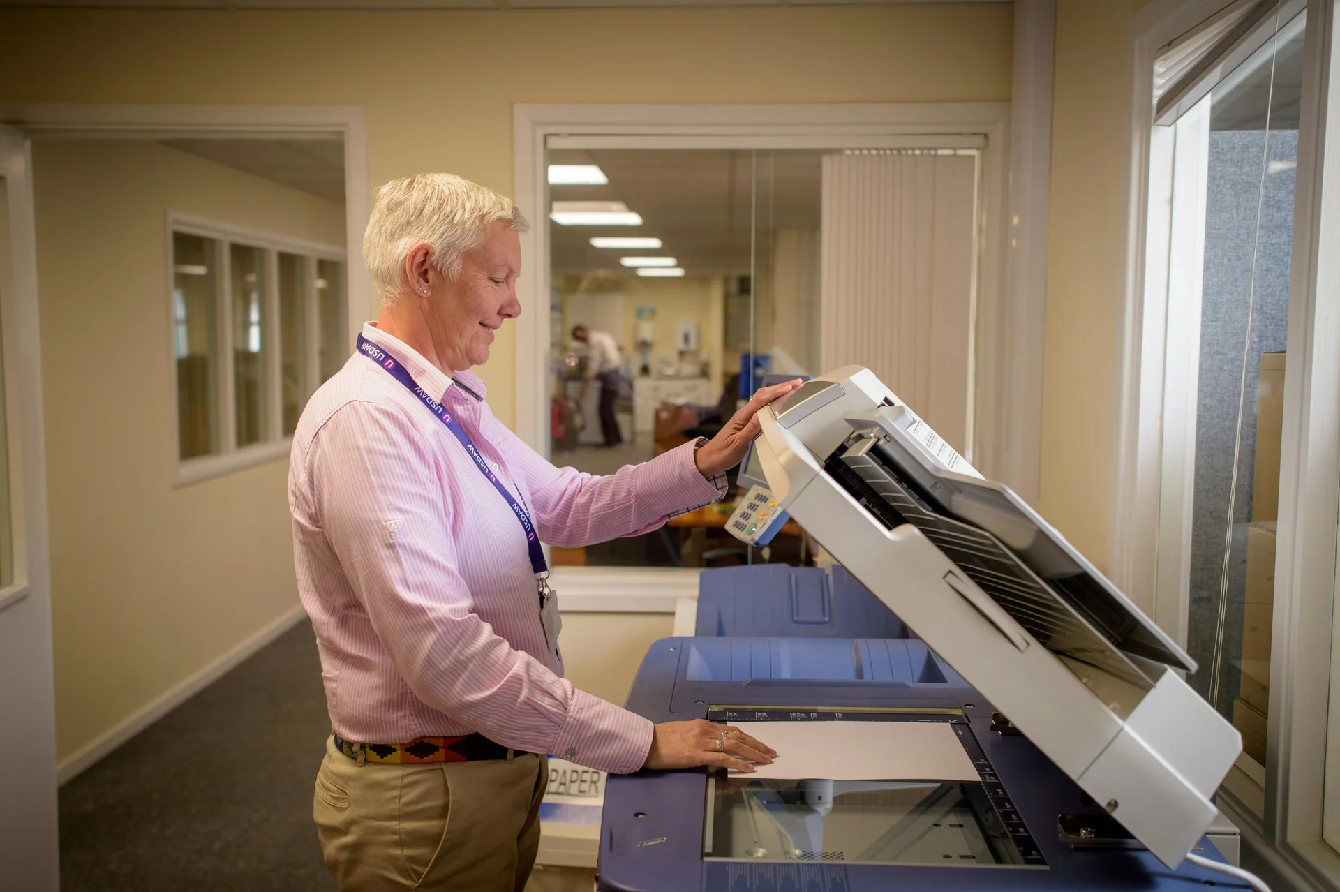 Woman using the copying machine
