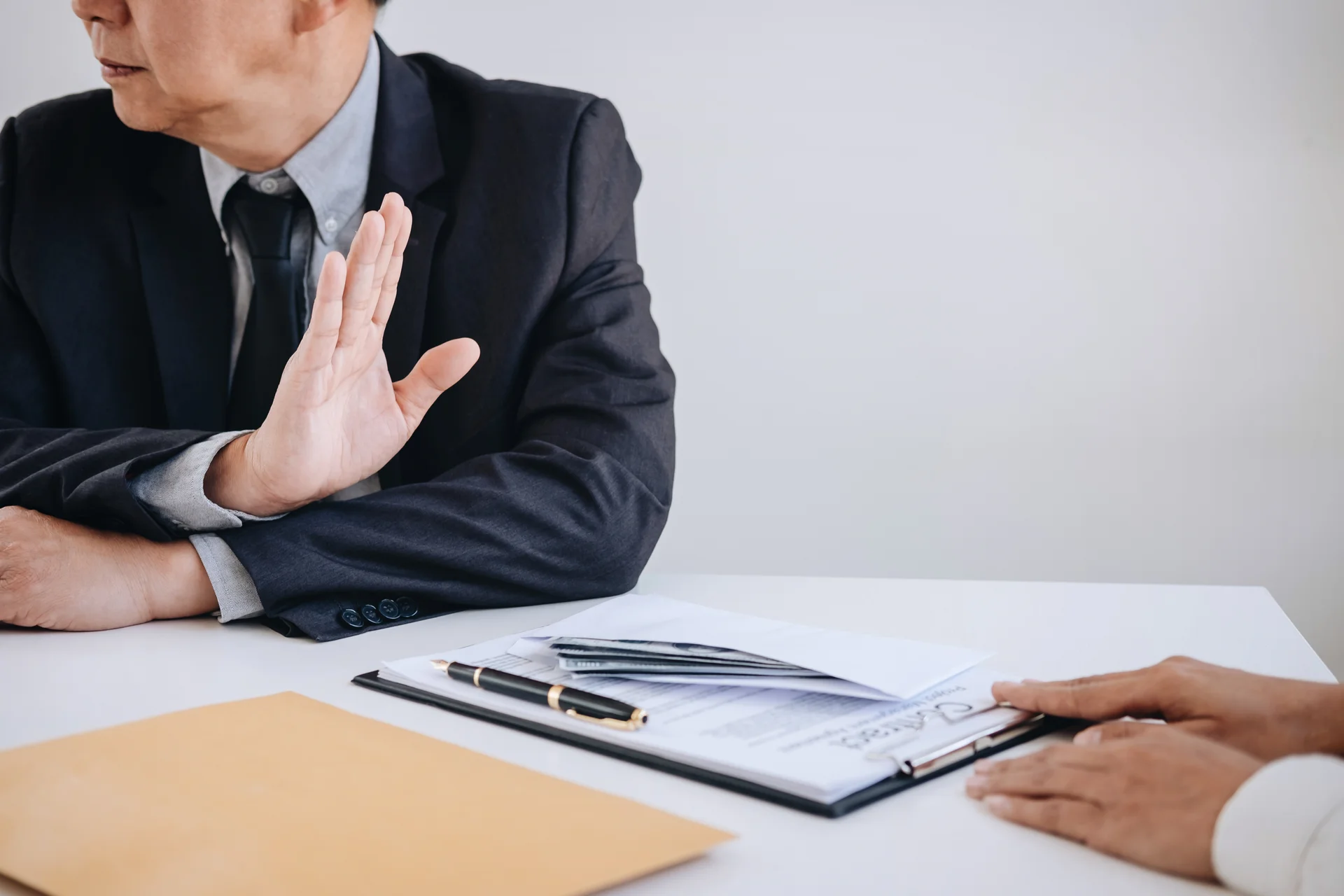 A man refusing contract documents