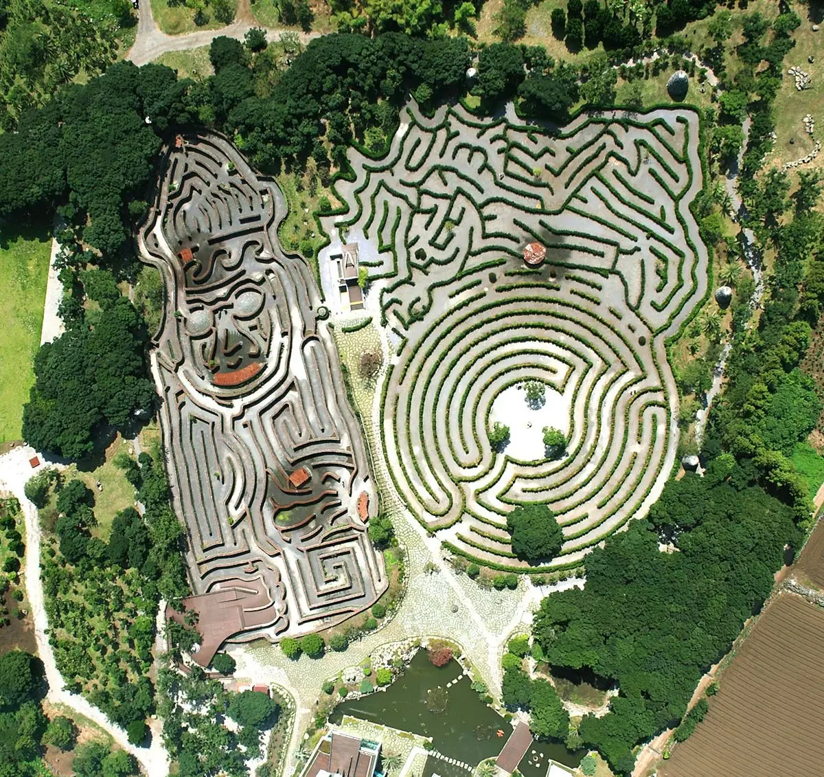 Aerial view of Maze Land in Jeju Island, South Korea, featuring stone and hedge mazes designed for family-friendly outdoor exploration and cultural experiences.