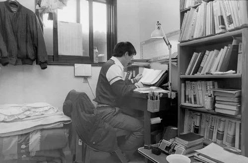 Student studying in a small Goshiwon room during the 1990s.