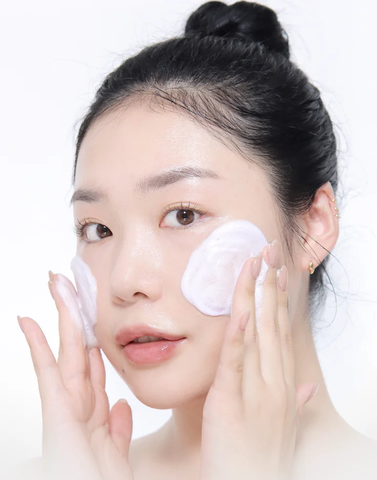 woman who applying skincare products