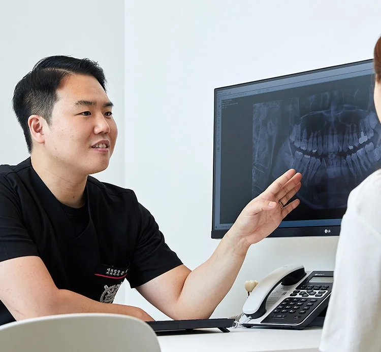 불당동치과_원장진료이미지