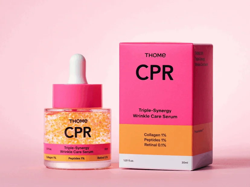 THOME CPR 세럼과 패키지 박스 핑크 배경 제품 사진