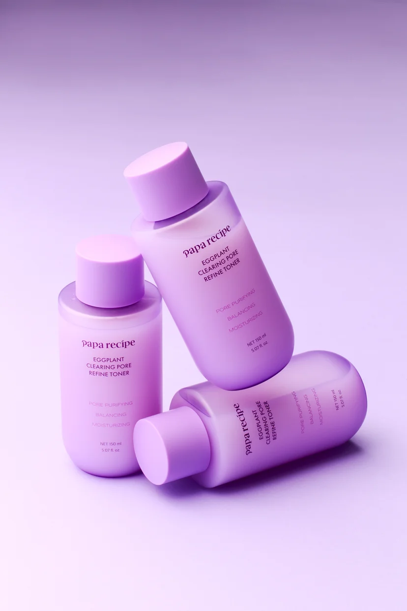 Three bottles of Papa Recipe Eggplant Clearing Pore Refine Toner 150ml arranged together against a lavender background, labeled with pore purifying, balancing, and moisturizing