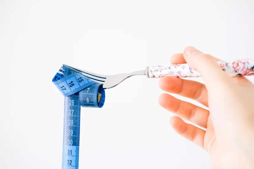 Fork with a measuring tape