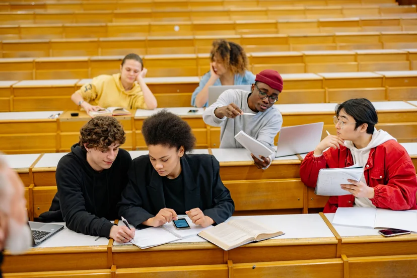 Students engage in a discussion over math lessons.