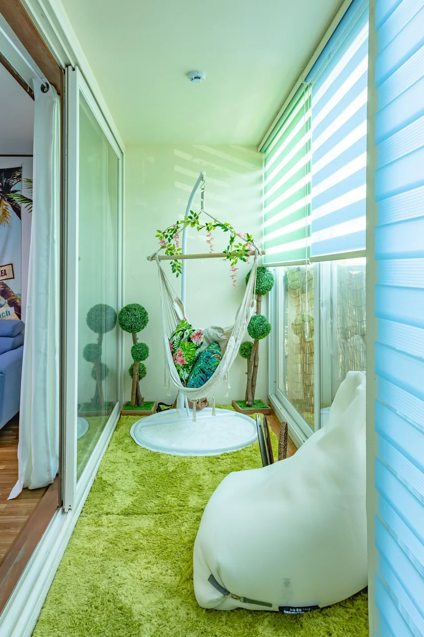 Enclosed balcony lounge with a hanging swing chair and beanbag (Listing ID : 4764)