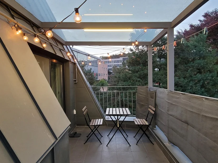 Terrace at dusk with warm string lights (Listing ID : 17400)
