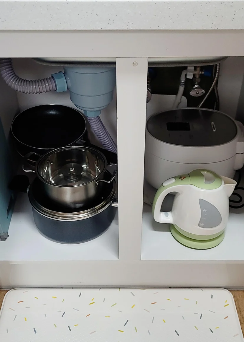 Under-sink storage with cookware, rice cooker, and electric kettle (Listing ID : 14800)
