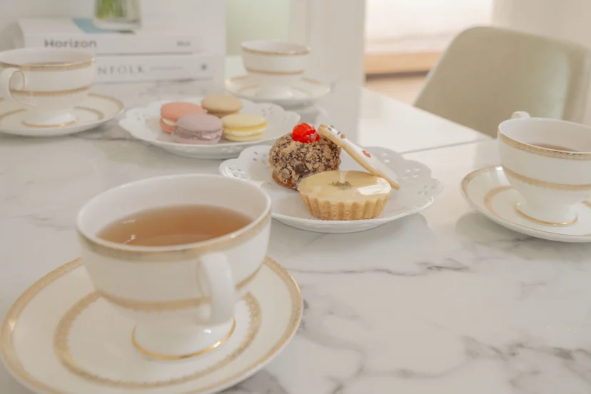 Marble table set with tea cups and pastries (Listing ID : 34458)