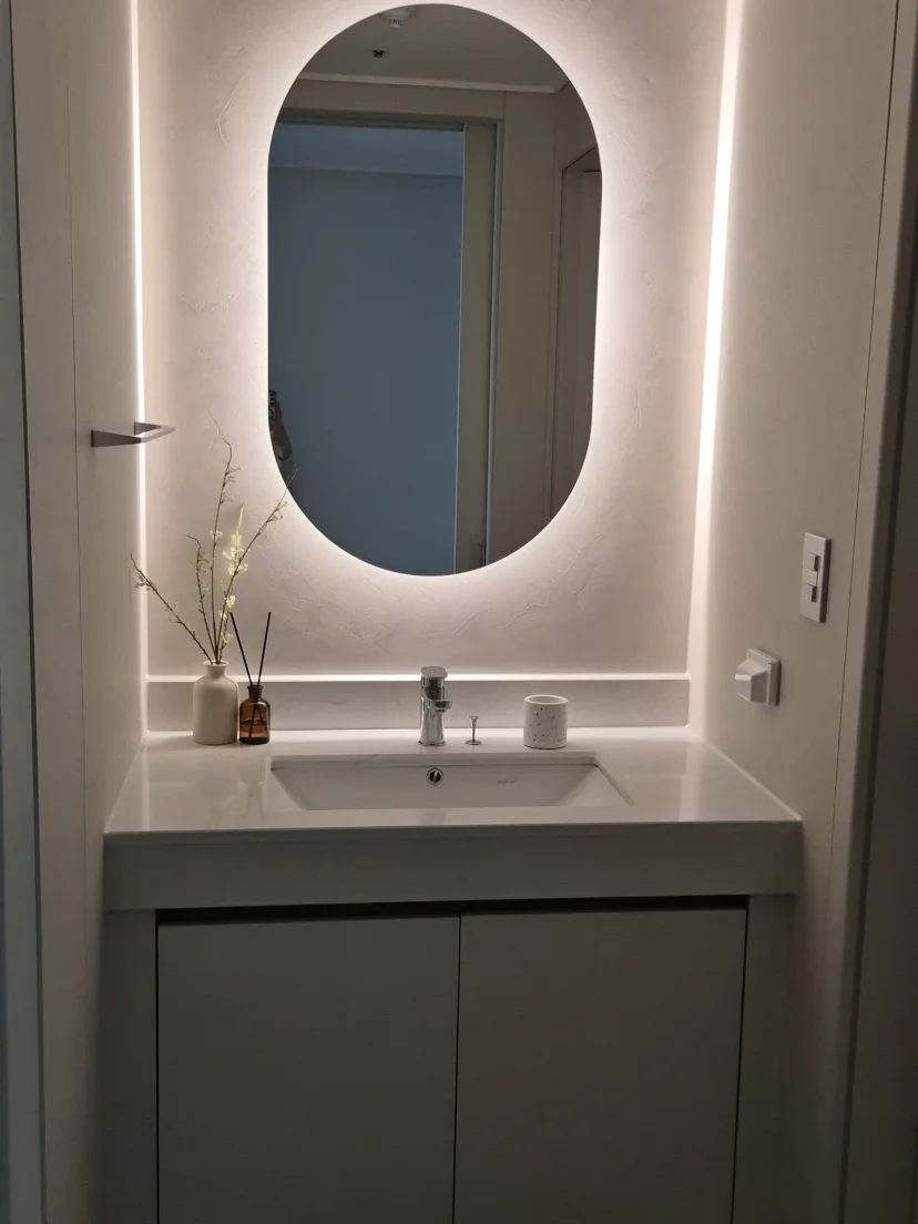 Bathroom vanity with a backlit mirror and sink (Listing ID : 46438)