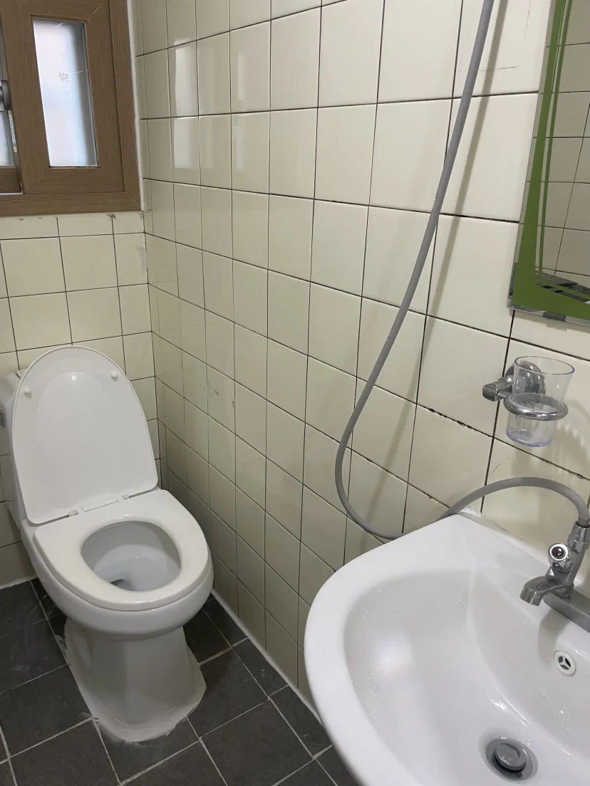 Tiled bathroom with toilet, basin and shower (Listing ID : 46995)