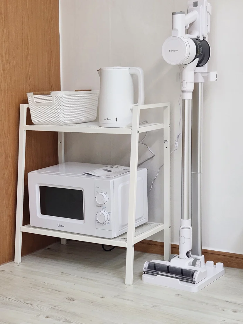Shelf with microwave, electric kettle, and a cordless stick vacuum (Listing ID : 44317)