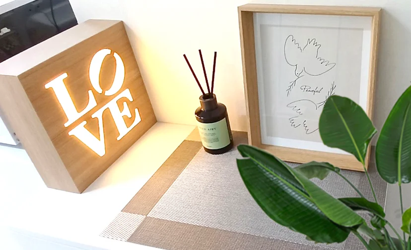 Cozy shelf corner with a LOVE light box, reed diffuser, and framed wall art (Listing ID : 28802)