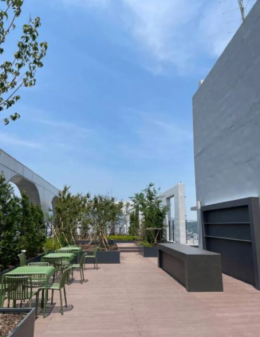 Rooftop terrace with bistro seating and planted greenery (Listing ID : 30596)