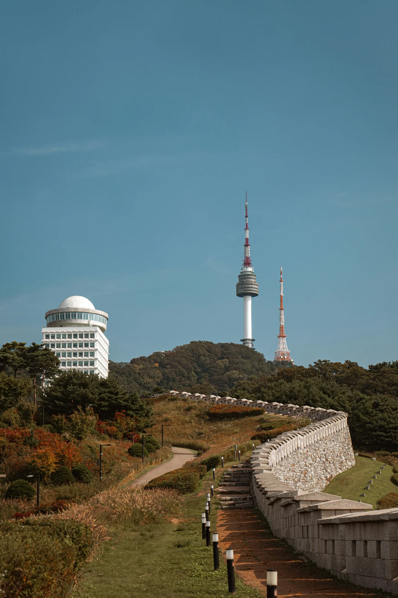 N Seoul Tower landmark rising above the trees on Namsan Mountain in Seoul