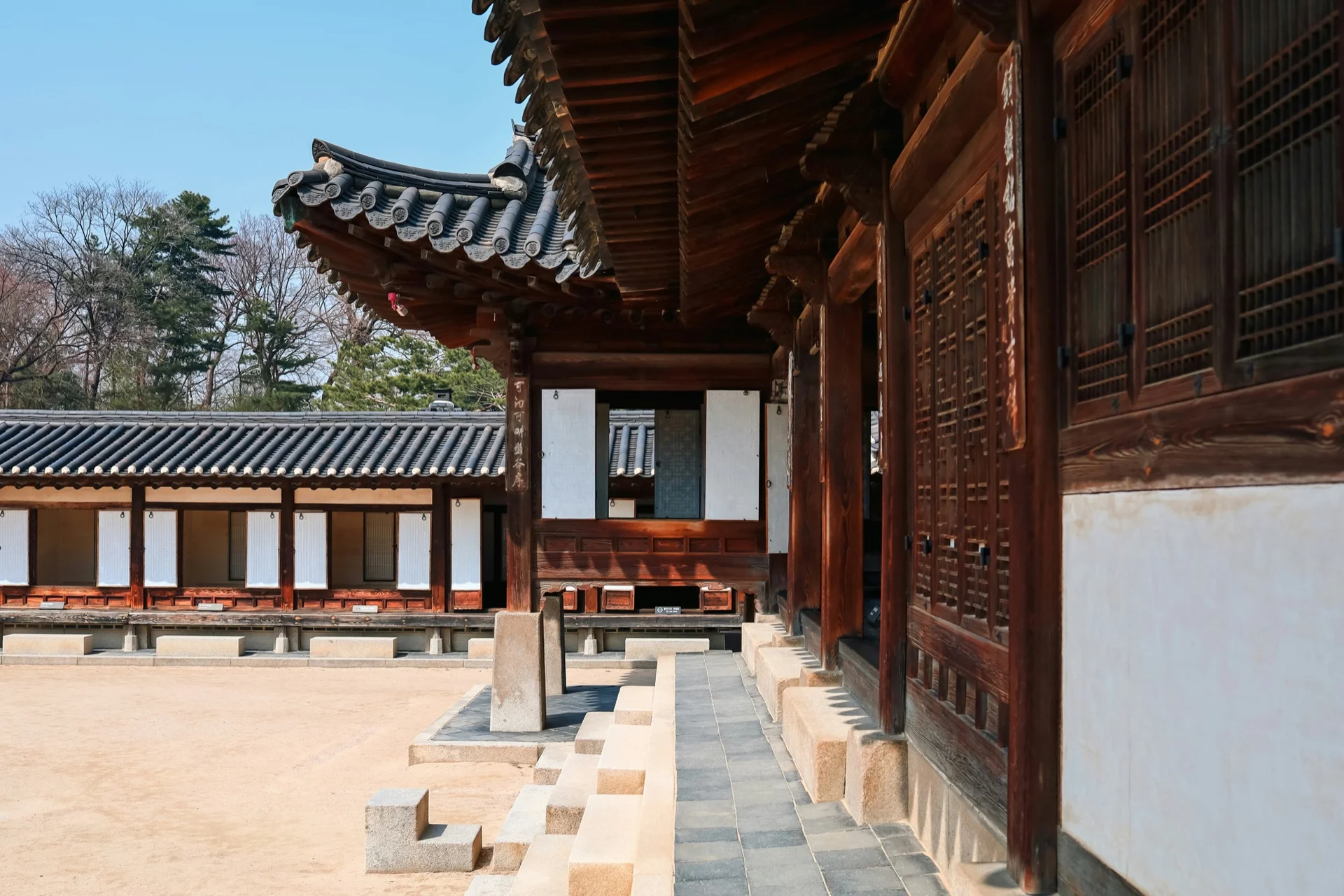 Traditional wooden walkway and architecture at Changdeokgung Palace in Seoul